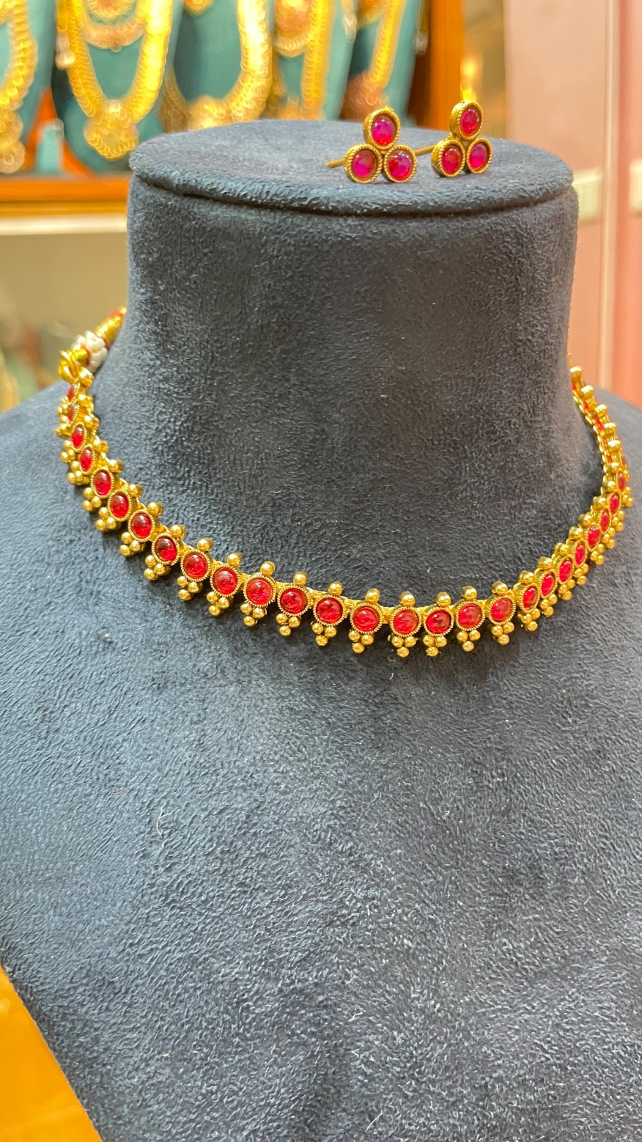 Reddish pink stone necklace angle 3
