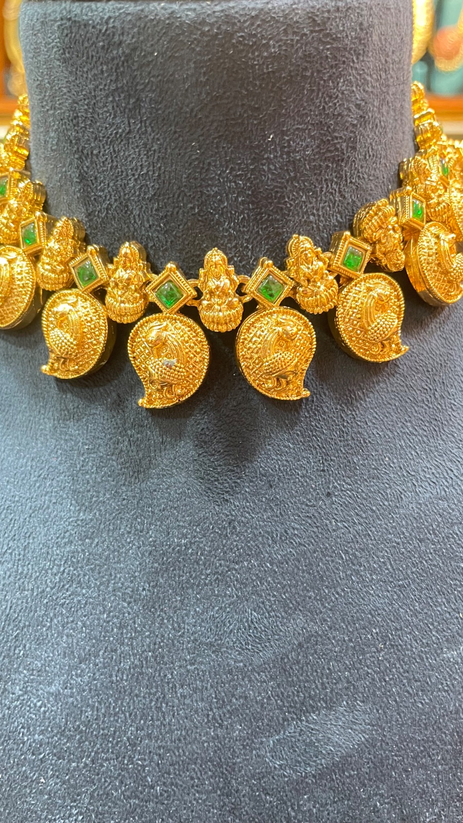 Small mango design necklace angle 4