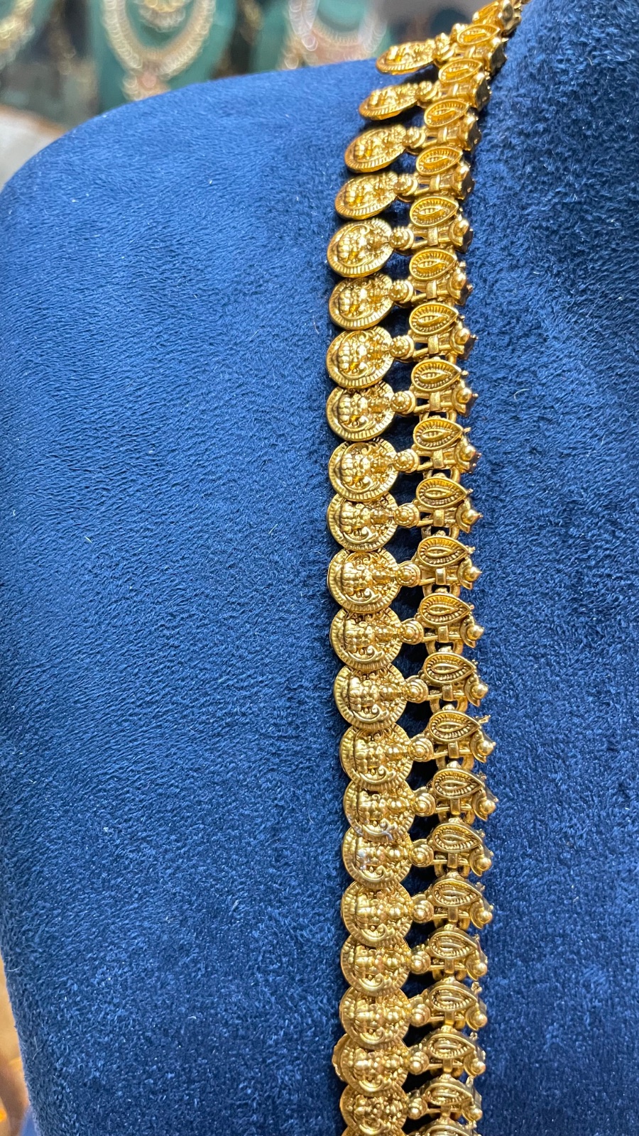 Puligoru design with peacock motifs pendant angle 2