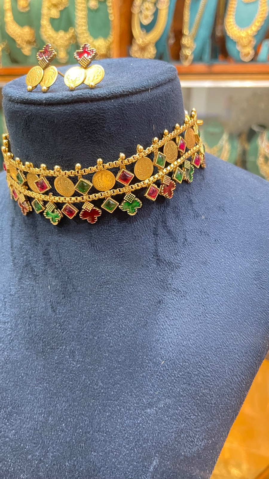 small coins with red and green diamond shape stone angle 2