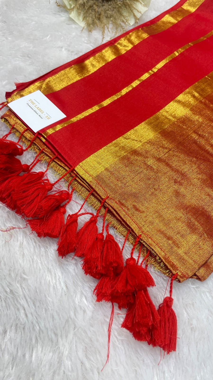 Reddish with gold saree
