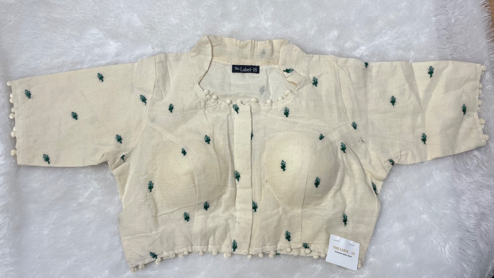 Cotton blouse with embroidery motifs