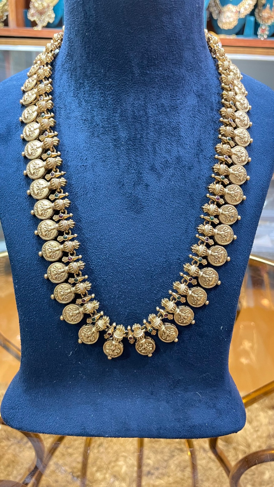 Small coins with green stones angle 4
