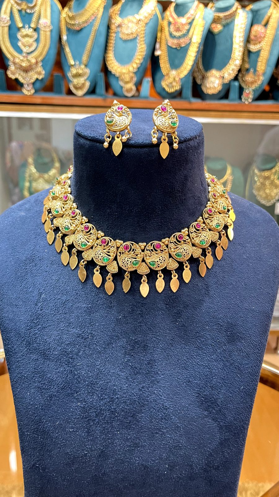 peacock motif necklace
