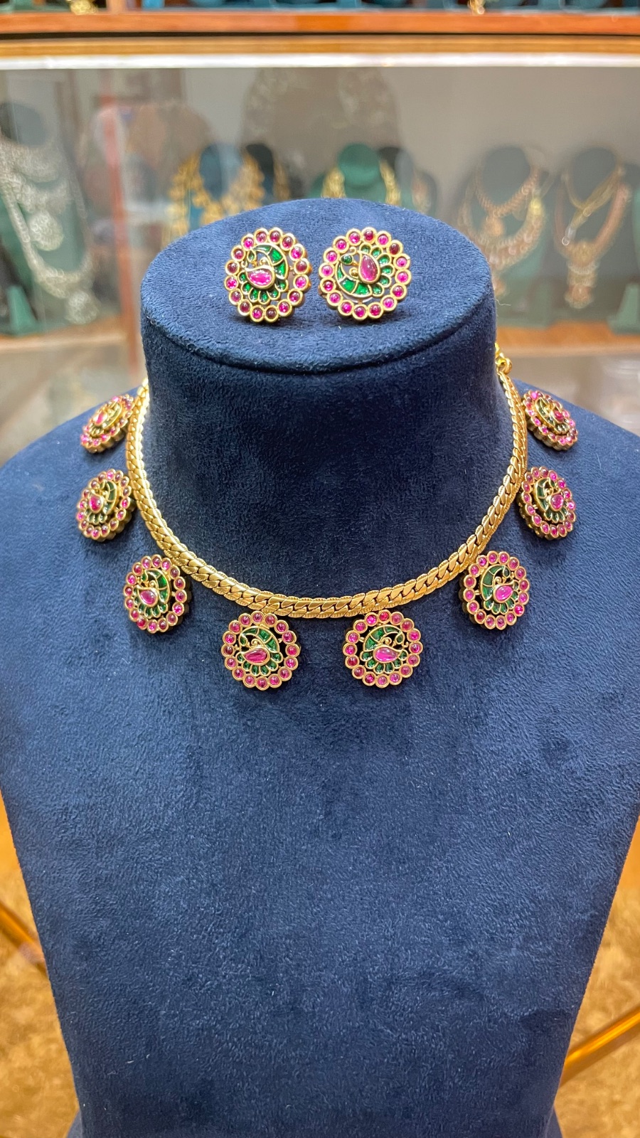 Peacock design with pink stones