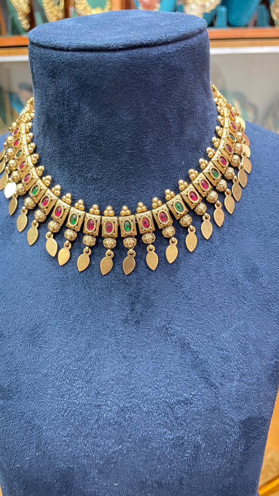 Green and red stones with leaf drops angle 4