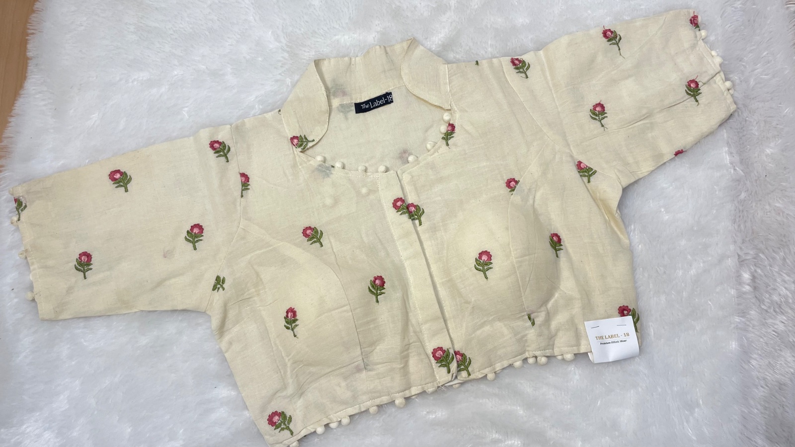 Cotton blouse with small embroidery motif