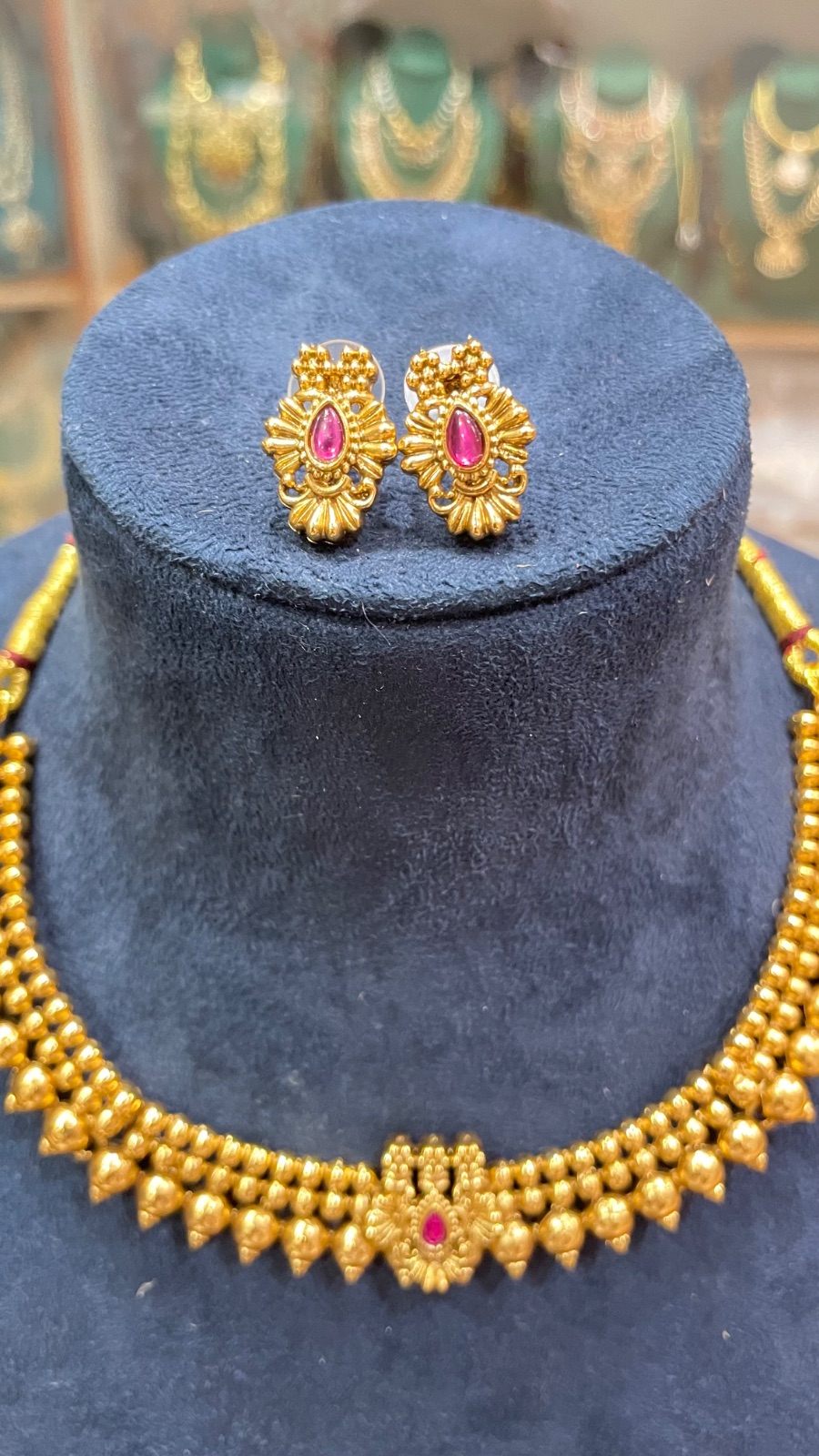 Golden Gundu design necklace