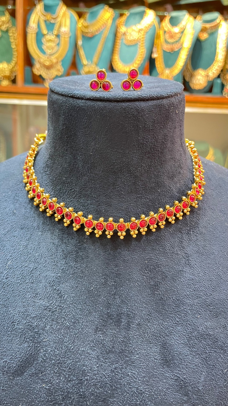 Reddish pink stone necklace