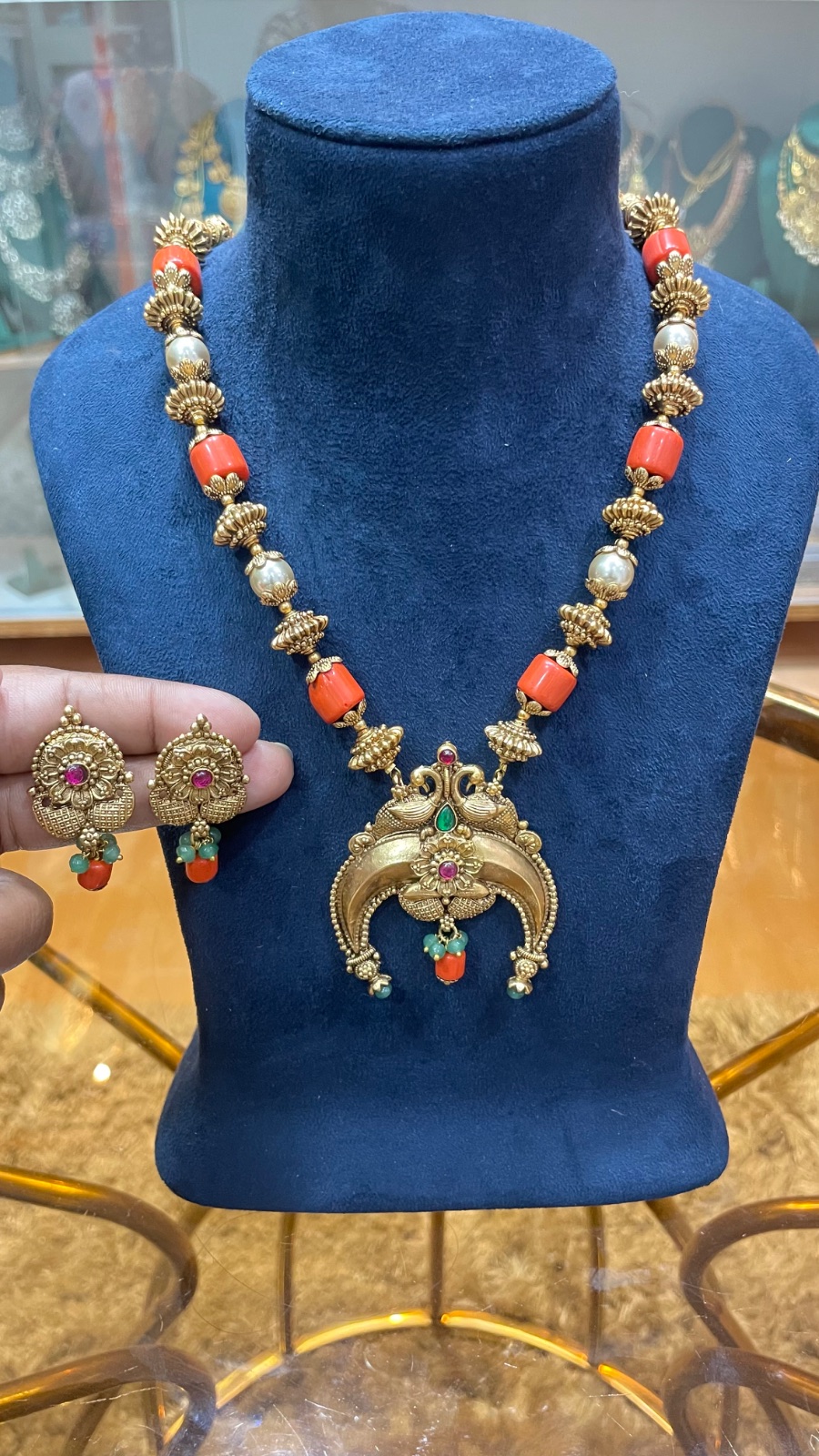 Coral and golden beads haram