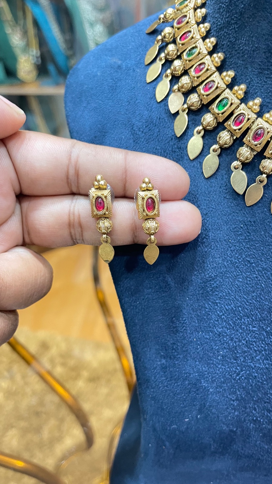 Green and red stones with leaf drops