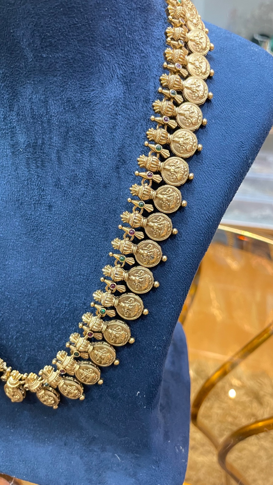 Small coins with green stones angle 3