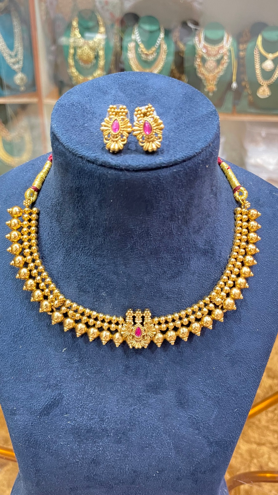 Golden Gundu design necklace