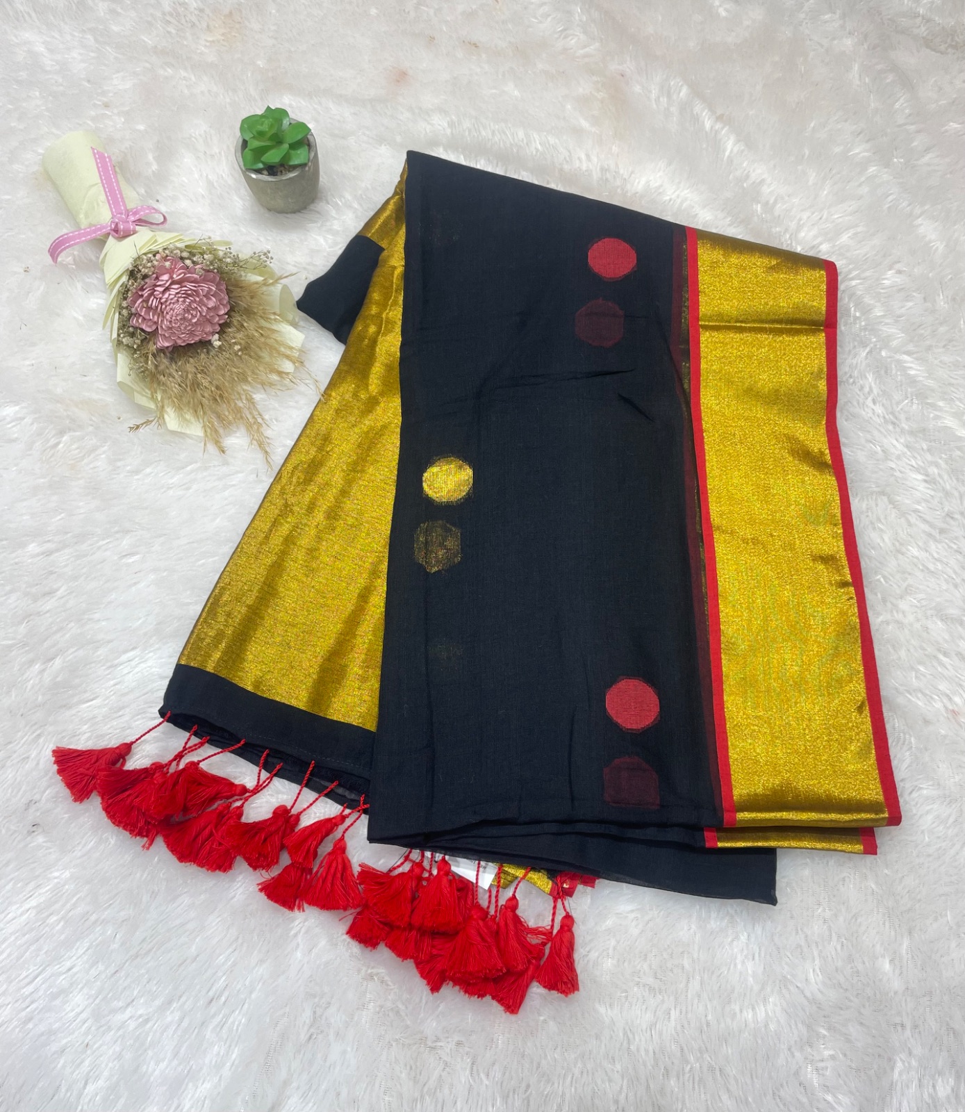 Gold border black saree