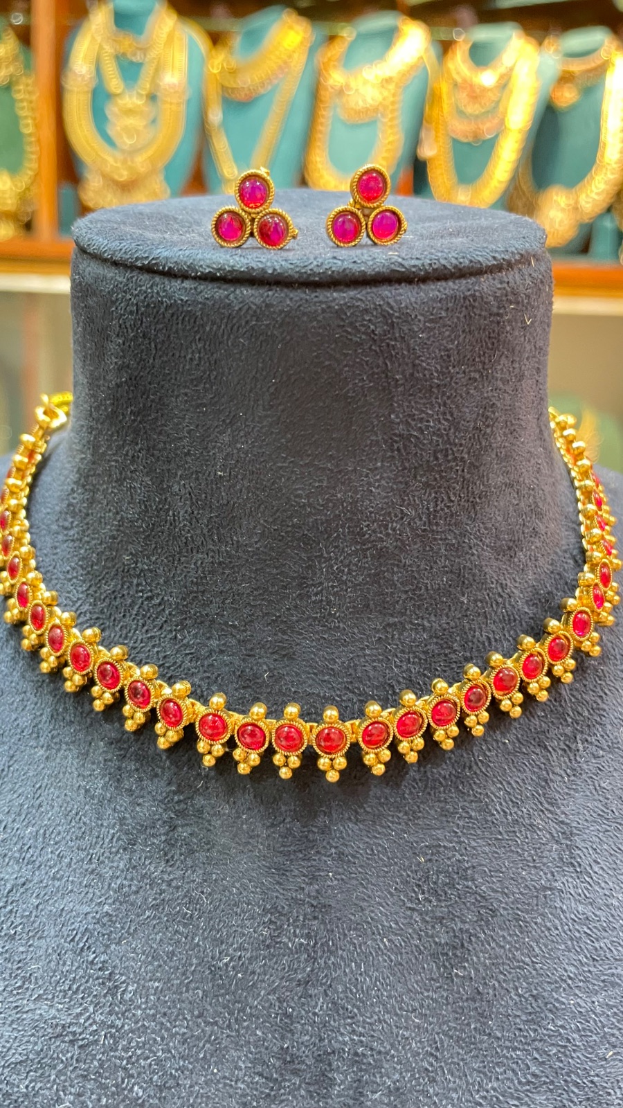 Reddish pink stone necklace