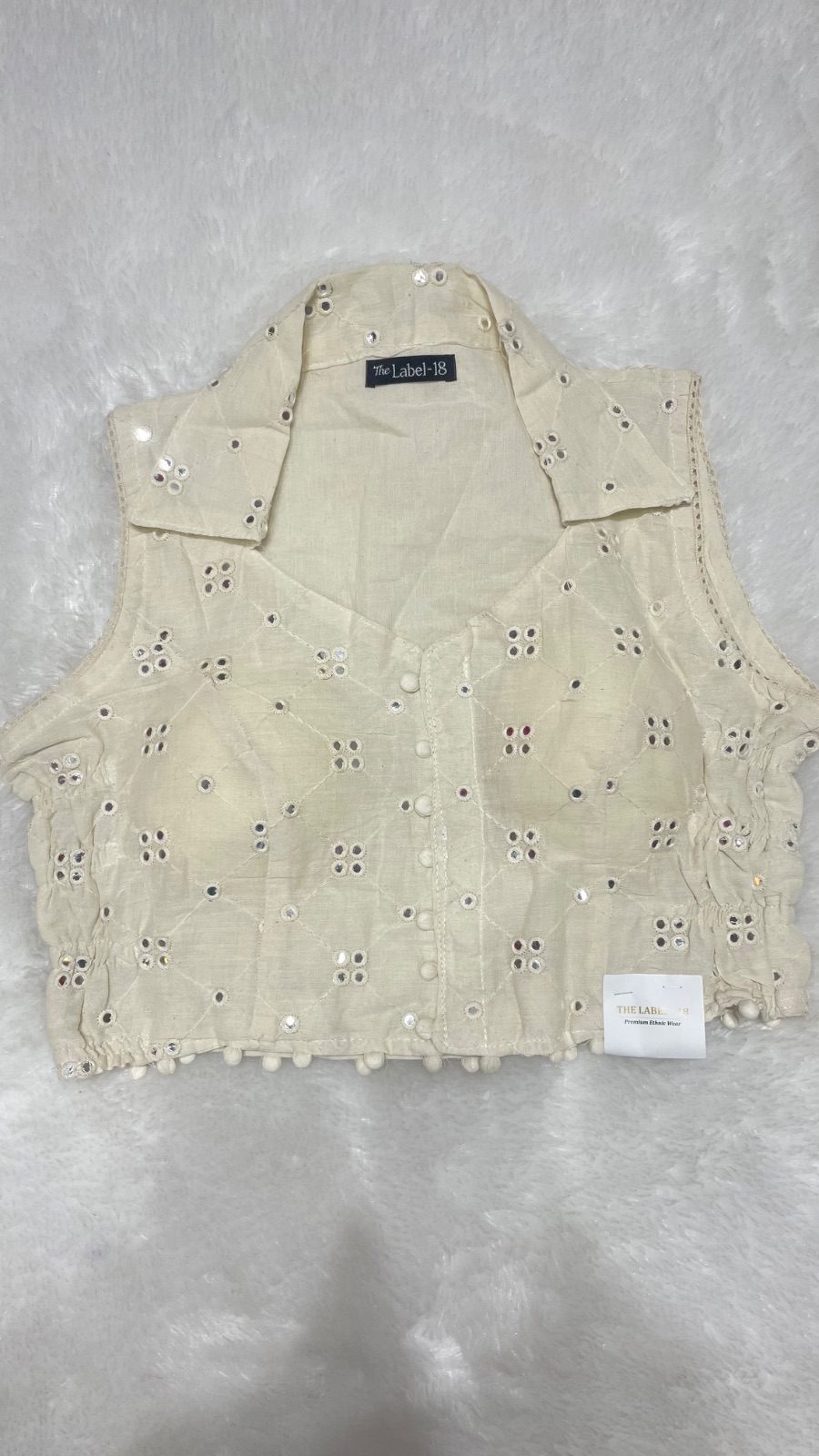 Sleeveless side elastic blouse