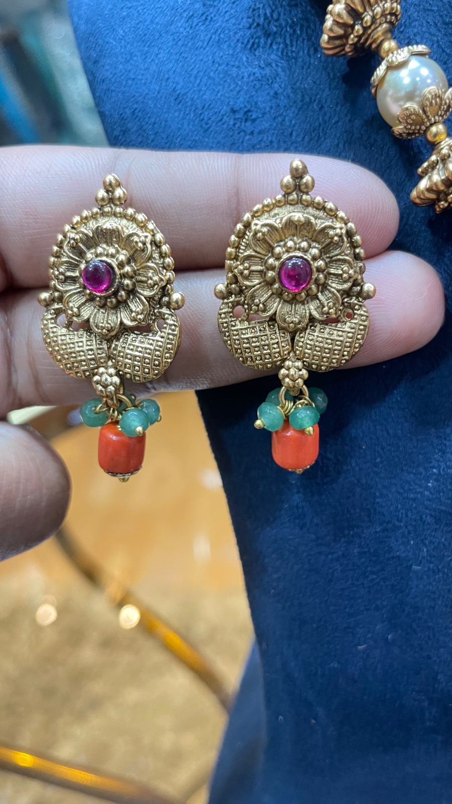 Coral and golden beads haram